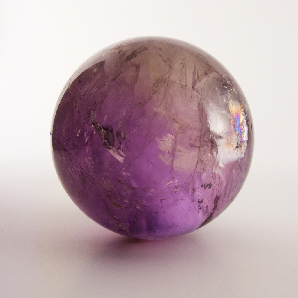 polished crystal amethyst sphere featuring crystal spheres from around the world. 