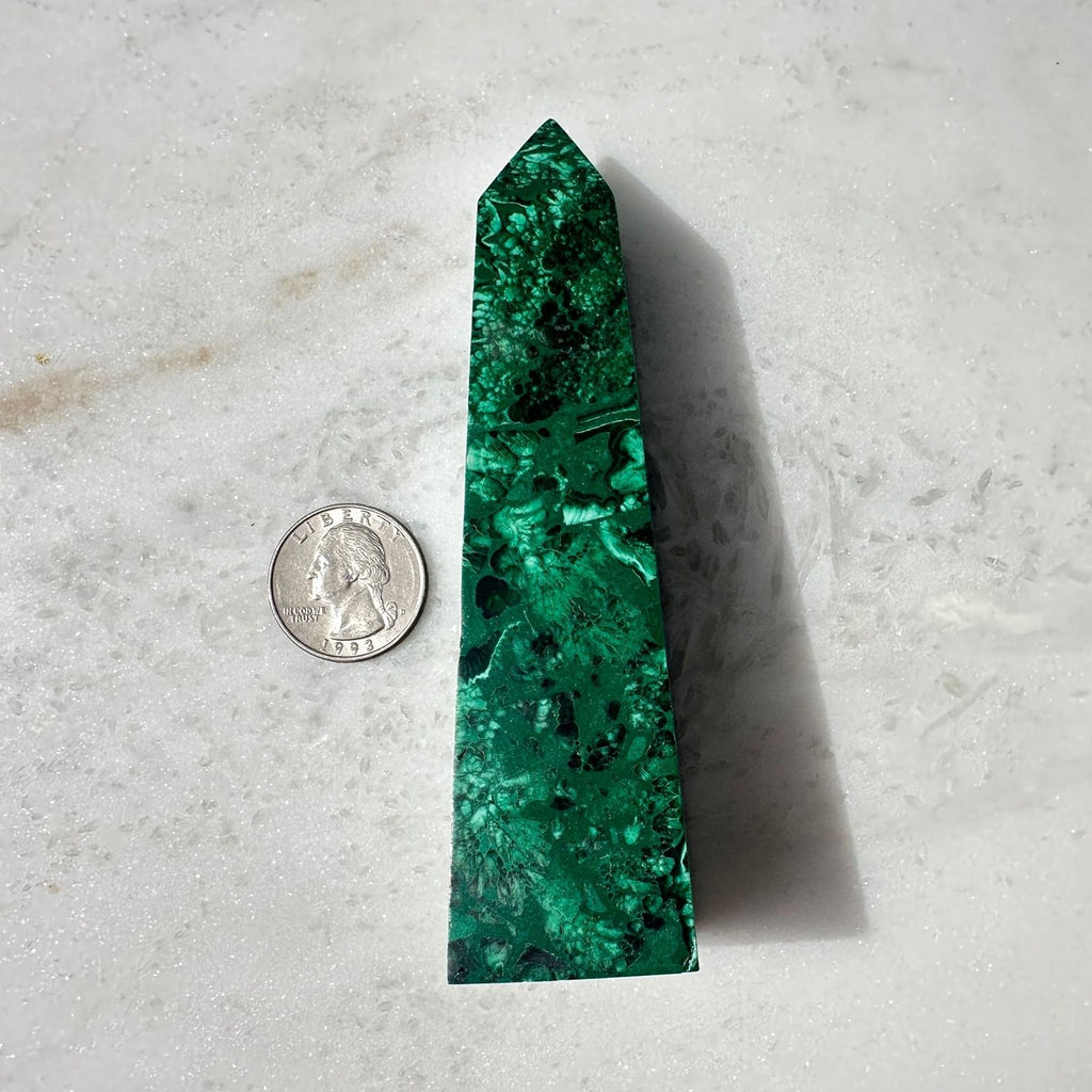 Malachite Obelisk from the DR of Congo with Quarter for scale