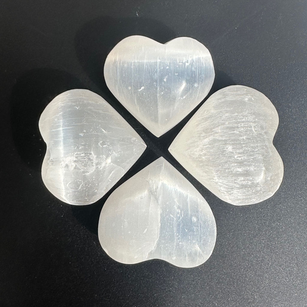 Selenite Hearts in a grouping of 4 shaped like a four leaf clover
