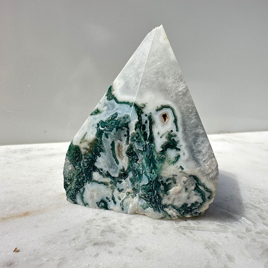Tree agate point with clear quartz inclusions