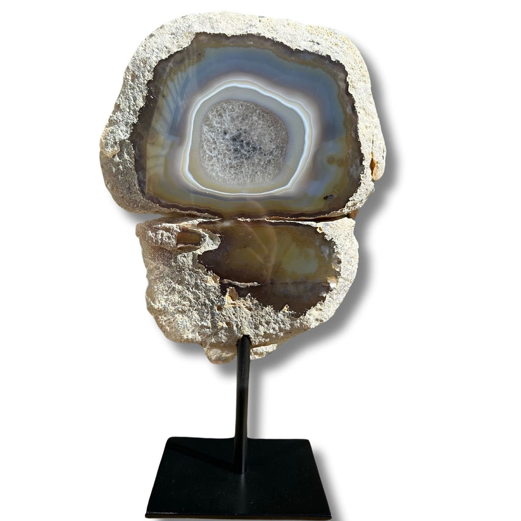 Back view of polished agate on a stand piece, with raw edges for a stunning home decor crystal piece