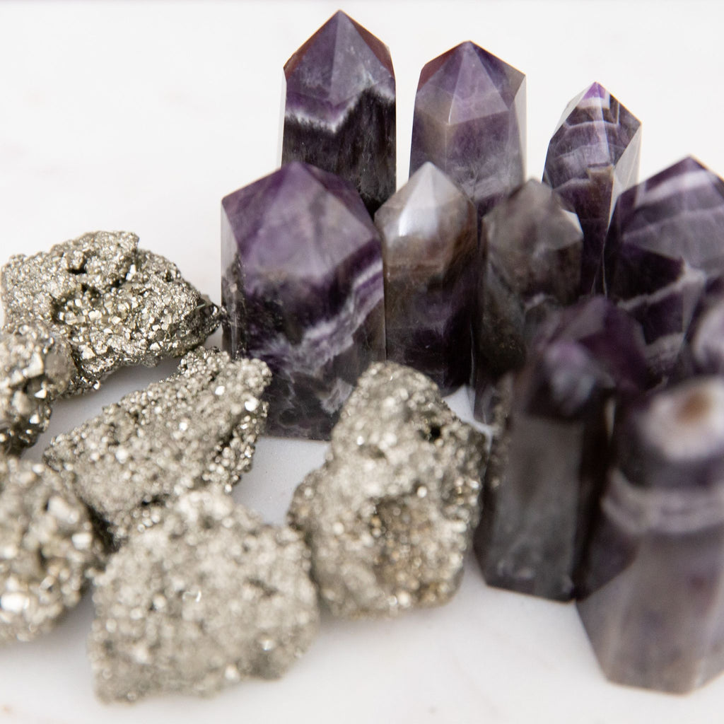 raw pyrite and chevron amethyst towers, crystals that are perfect for beginners. 