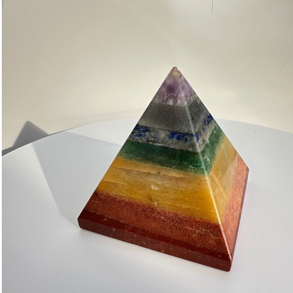 Chakra Crystal pyramid carving in natural sunlight