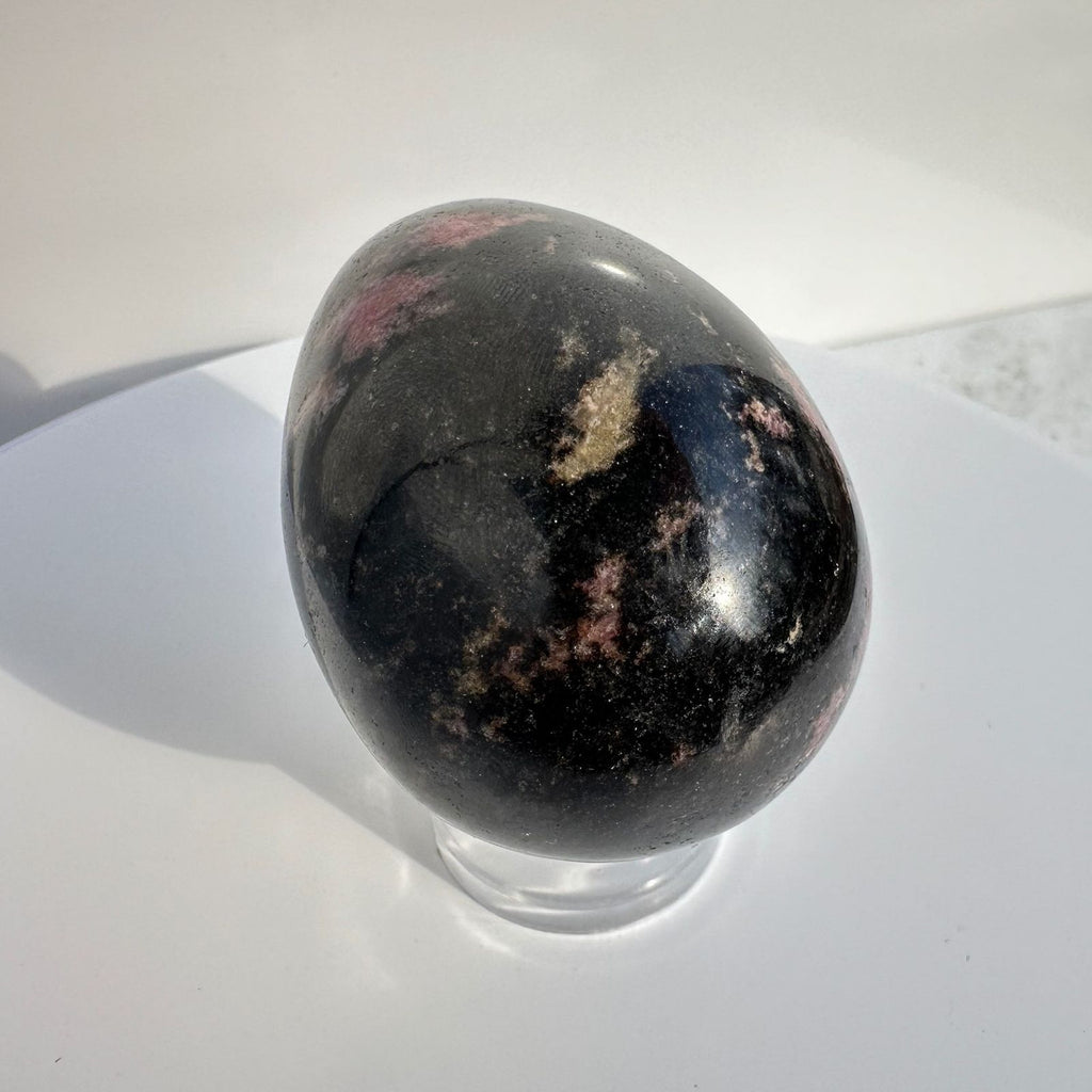 Egg carving made from Rhodonite crystal found in Brazil