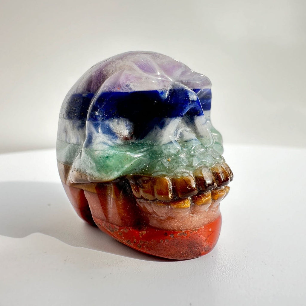 chakra carving crystal skull with 7 different crystal variations combined