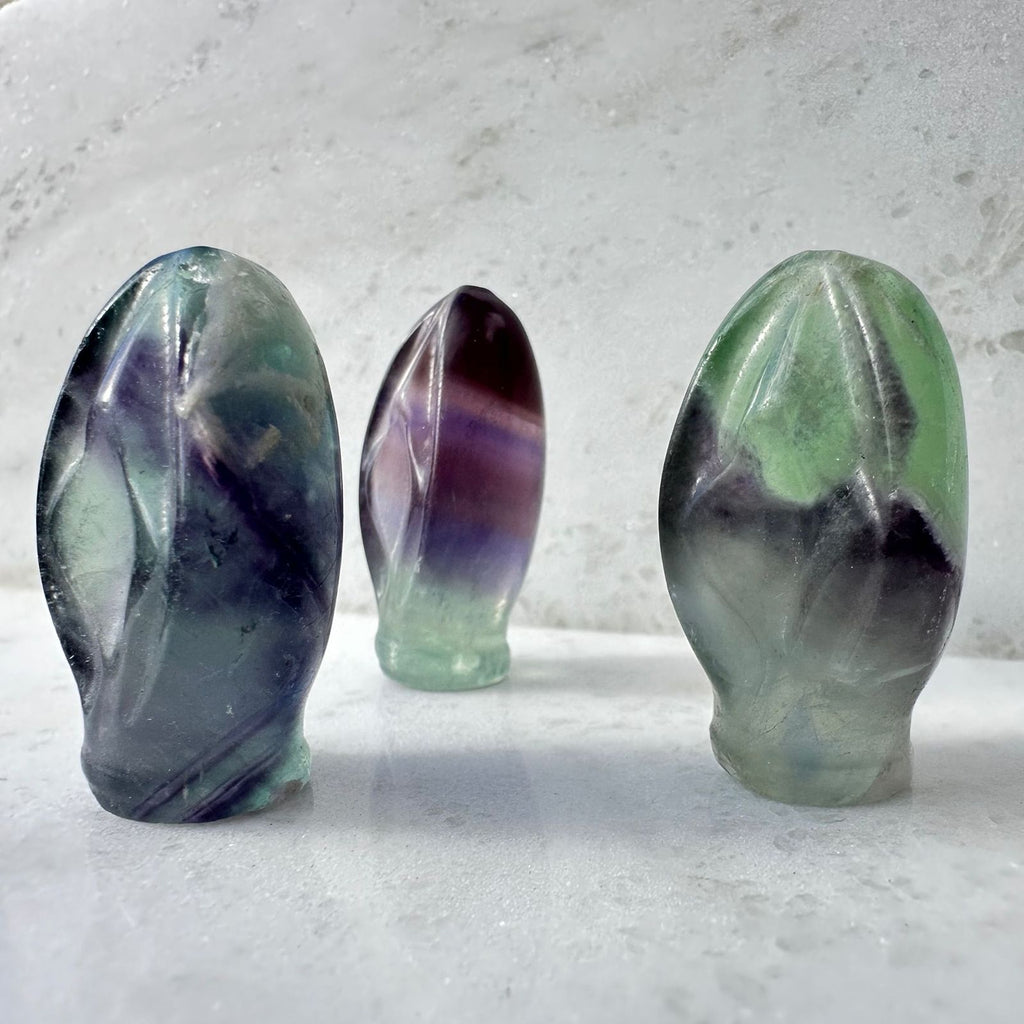 Portal to Paradise made out of Rainbow Fluorite, crystal vulva carvings