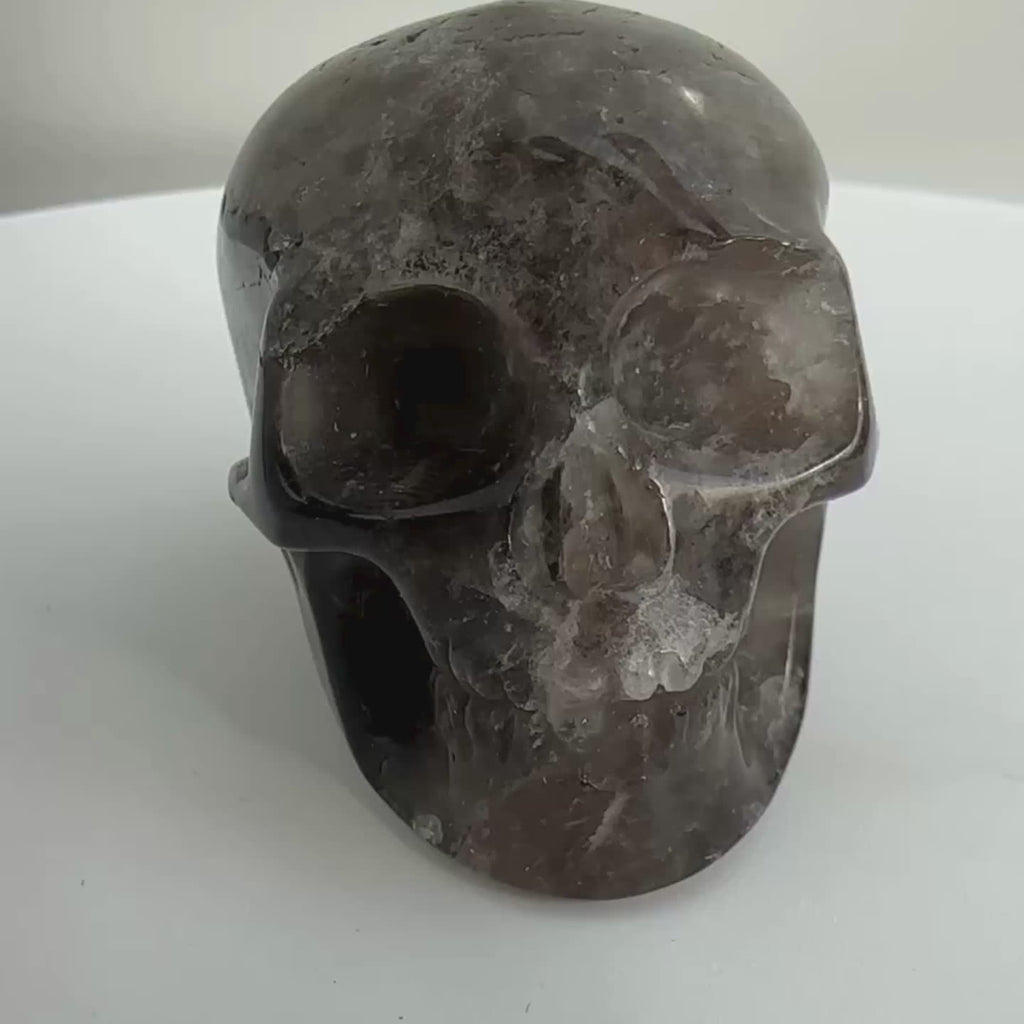 Smoky Quartz Crystal Skull Carving from Brazil, known for protection and manifestations