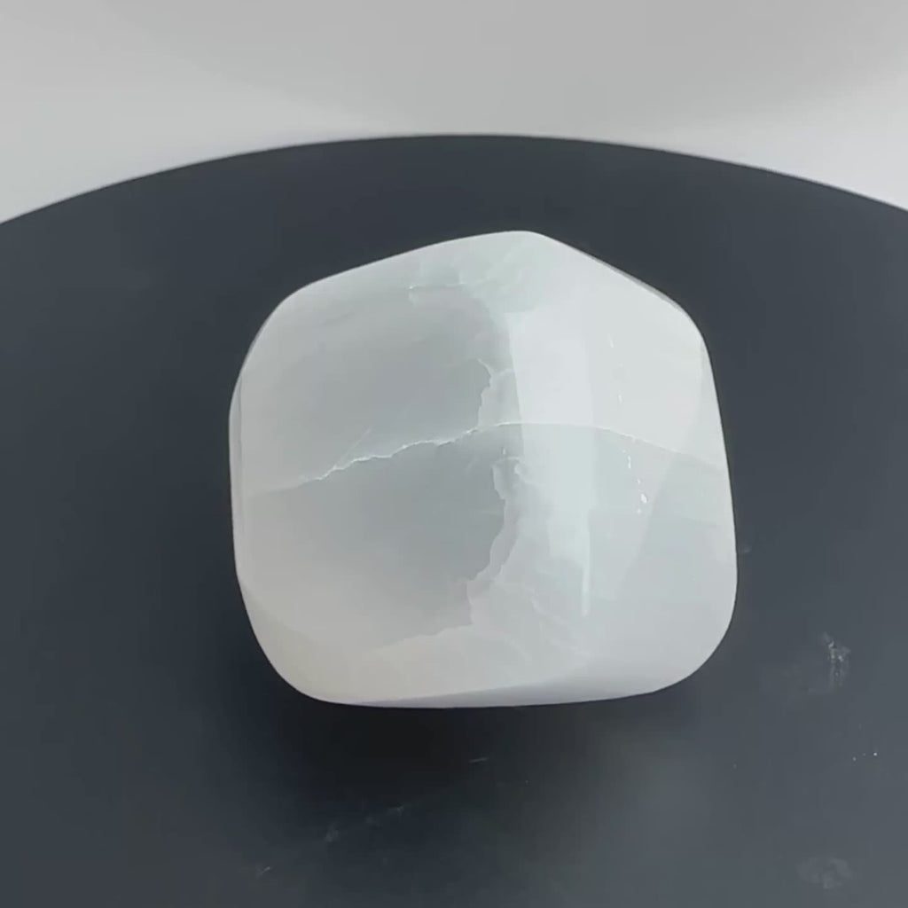 Selenite polished cube with a flat side to spin and sit flat, crystal carving