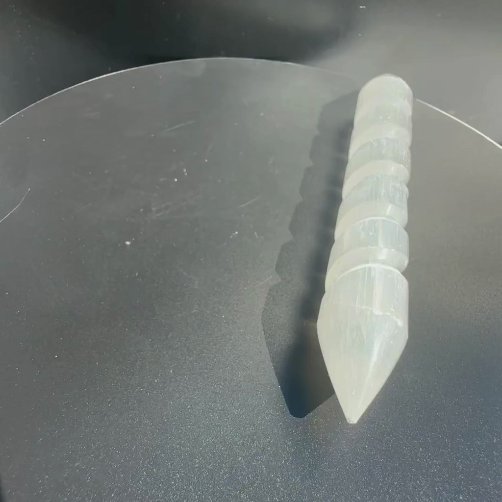 Polished Selenite Wand on a rotating display for clearer and detailed view