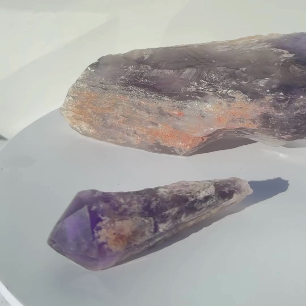 Bahia Amethyst Point from Brazil on rotating display with large and small size