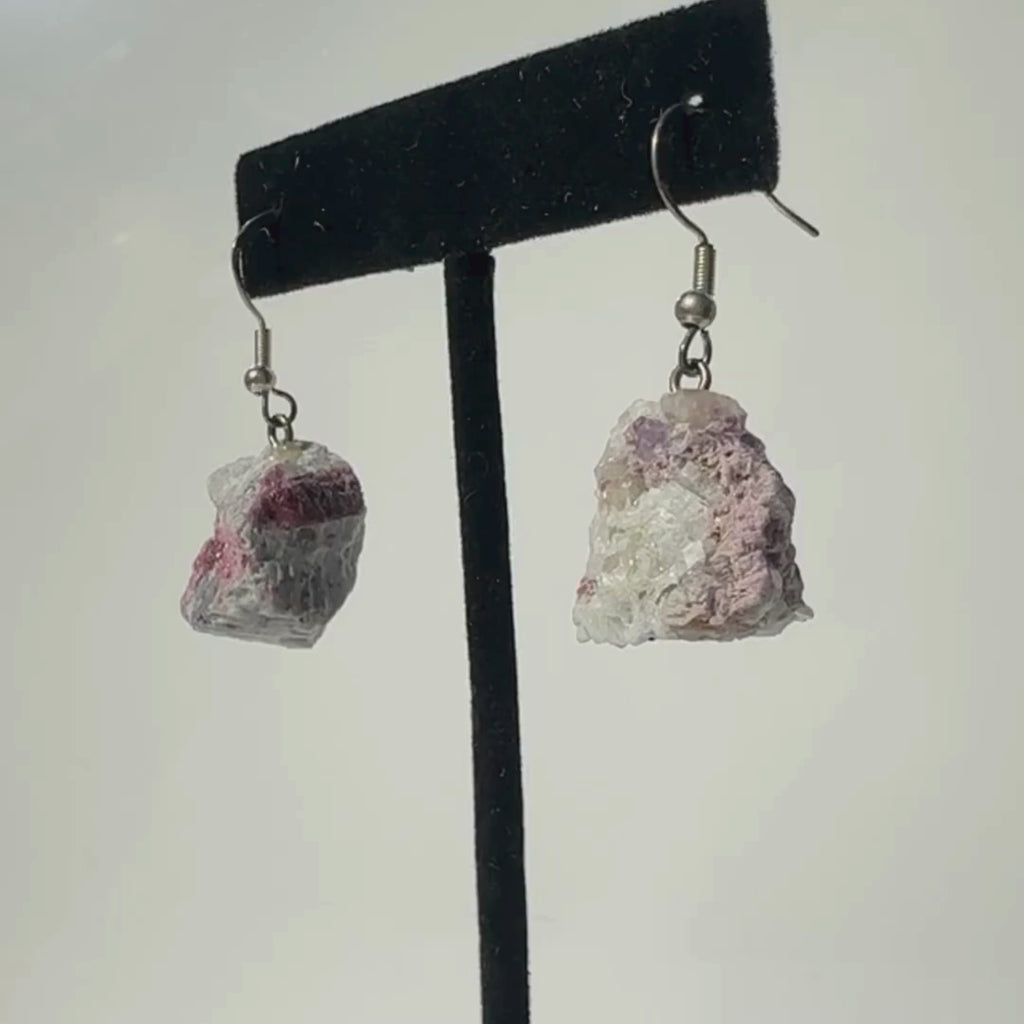 Raw Pink Tourmaline Earring on Display slowly rotating to show details of the earrings