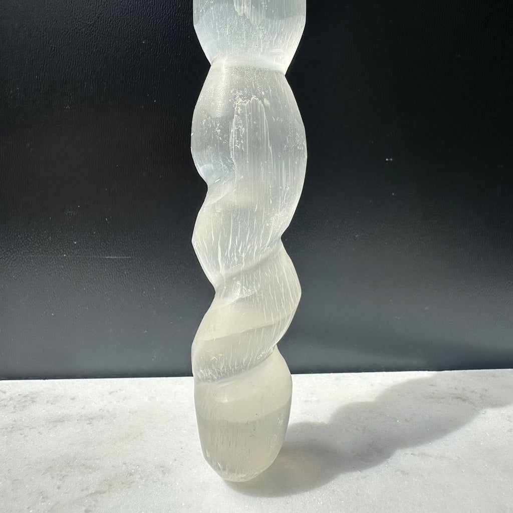 Curved handle of Selenite Sword crystal carving