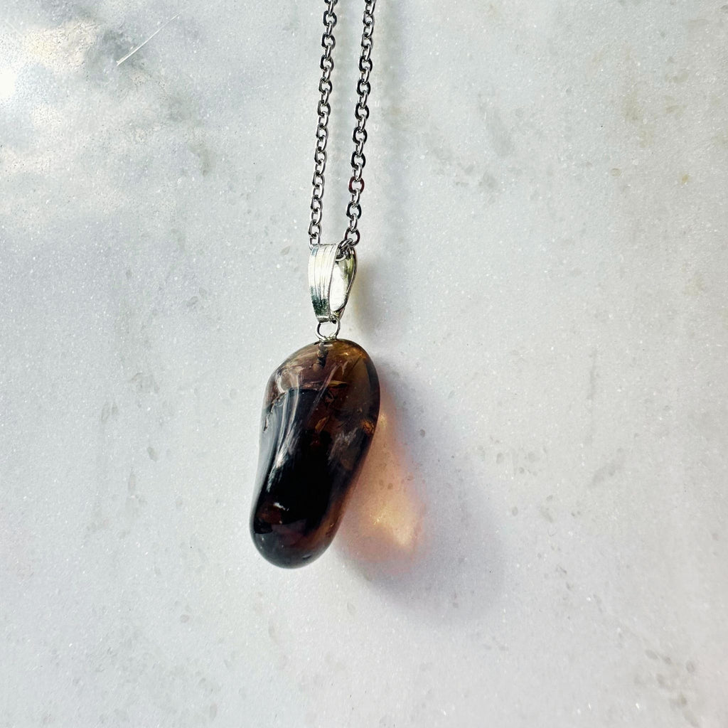 Smoky Quartz Pendant on a Silver Plated Chain, showing crystal jewelry
